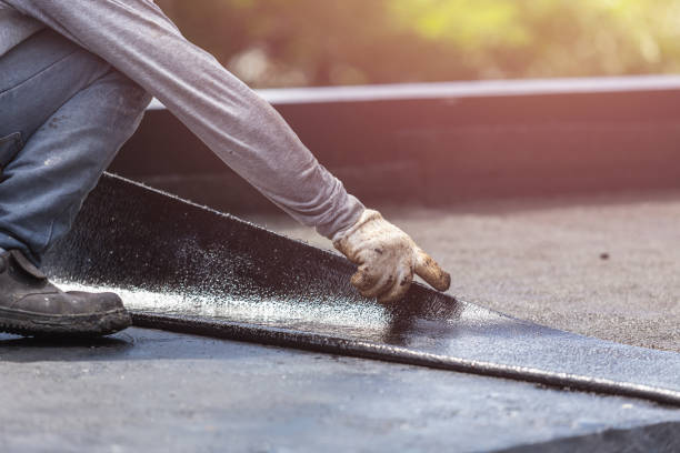 Professional Basement Waterproofing technician working in Oak Creek, WI